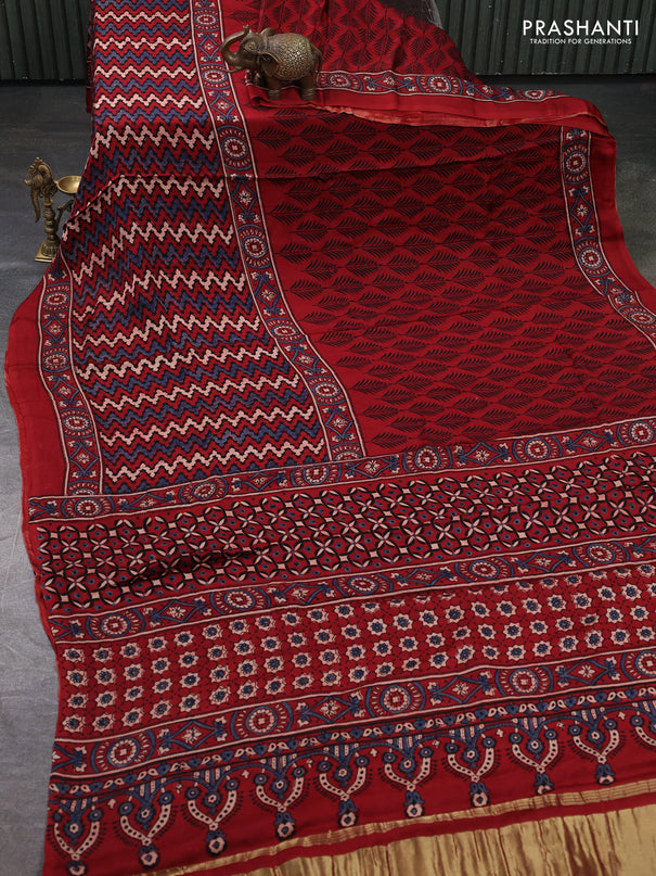 Modal silk saree maroon with allover ajrakh prints and printed border