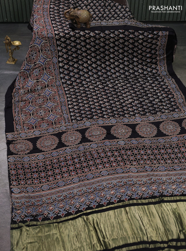 Modal silk saree black with allover ajrakh prints and printed border