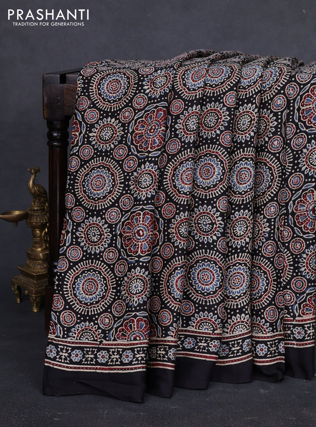 Modal silk saree black with allover ajrakh prints and printed border