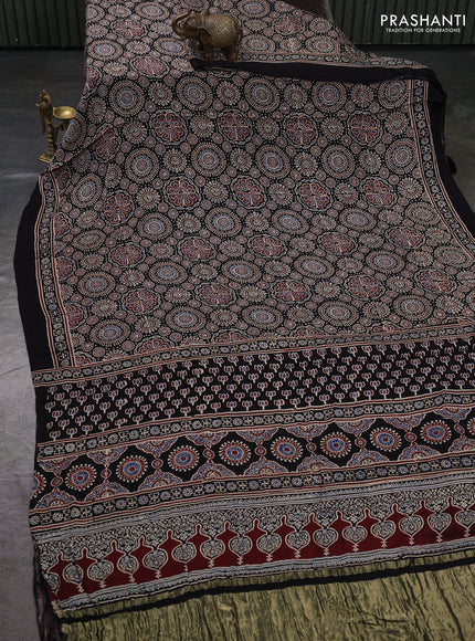 Modal silk saree black with allover ajrakh prints and printed border