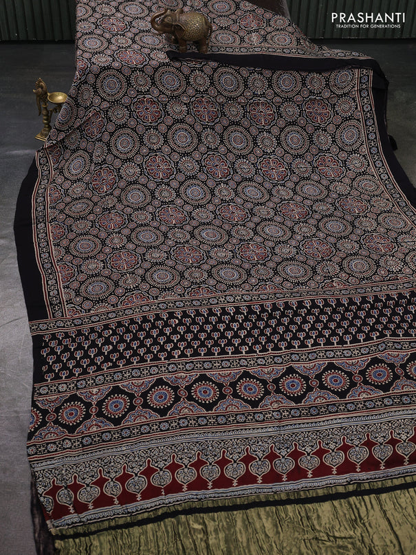 Modal silk saree black with allover ajrakh prints and printed border