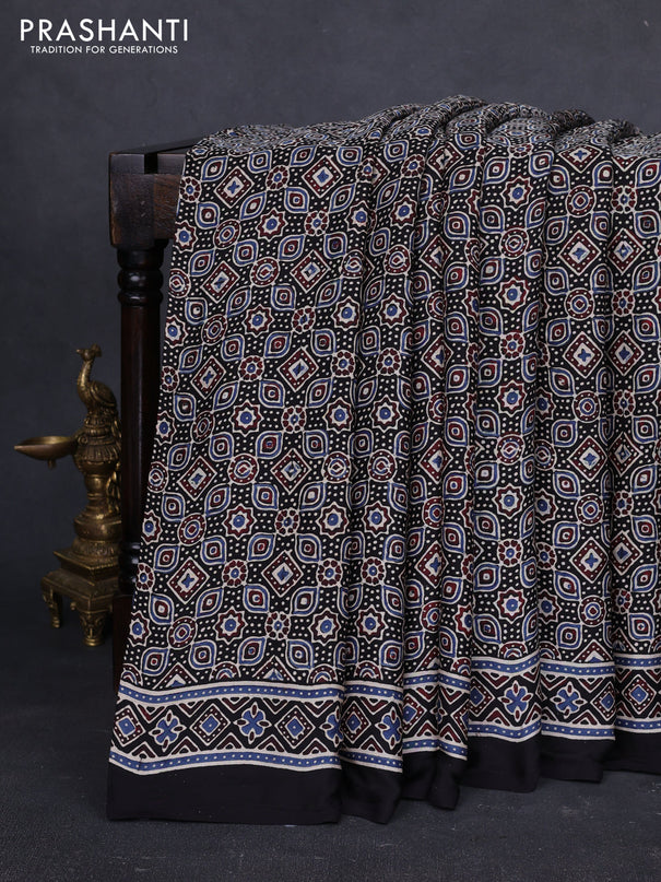 Modal silk saree black with allover ajrakh prints and printed border