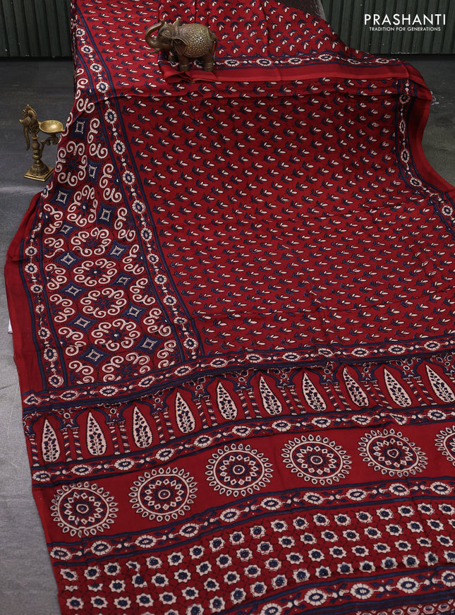 Modal silk saree maroon with allover ajrakh prints and printed border