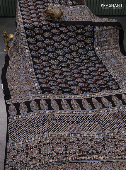 Modal silk saree black with allover ajrakh prints and long printed border