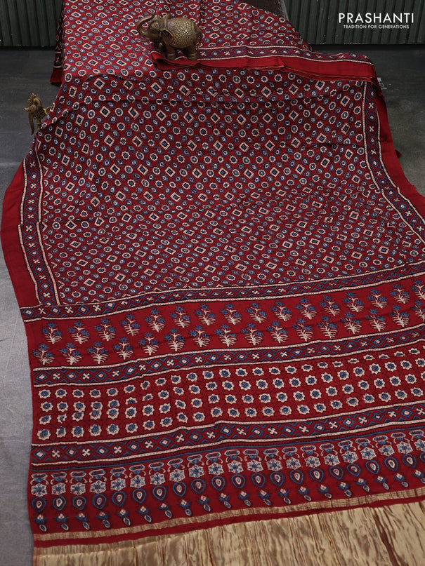 Modal silk saree maroon with allover ajrakh prints and printed border