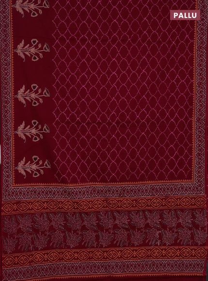 Cotton block printed saree maroon with allover prints and printed border