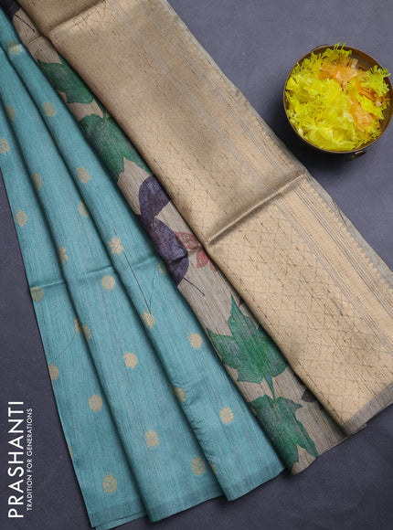 Art dupion saree teal green and beige with allover zari woven buttas and printed pallu