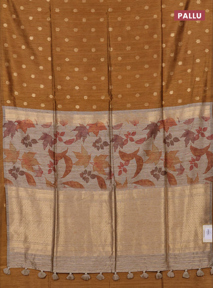 Art dupion saree dark mustard and beige with allover zari woven buttas and printed pallu