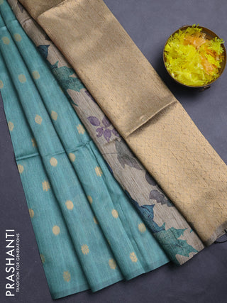 Art dupion saree pastel green and beige with allover zari woven buttas and printed pallu