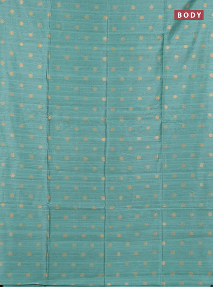 Art dupion saree pastel green and beige with allover zari woven buttas and printed pallu