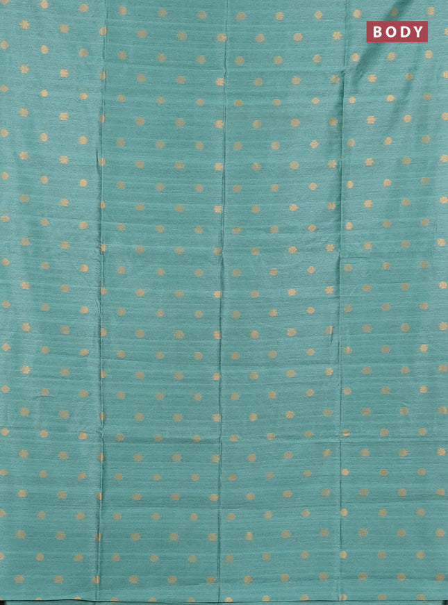 Art dupion saree pastel green and beige with allover zari woven buttas and printed pallu