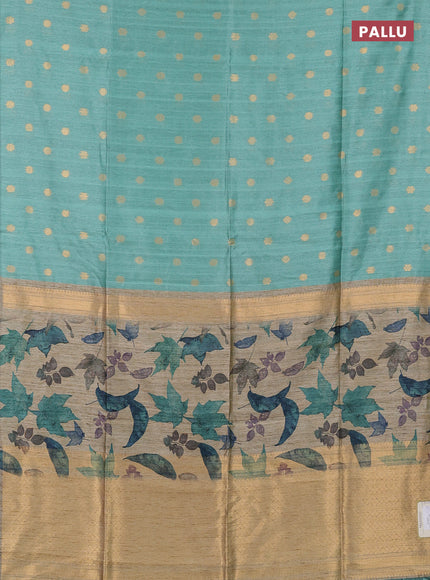 Art dupion saree pastel green and beige with allover zari woven buttas and printed pallu