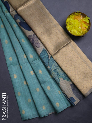 Art dupion saree teal green and beige with allover zari woven buttas and printed pallu