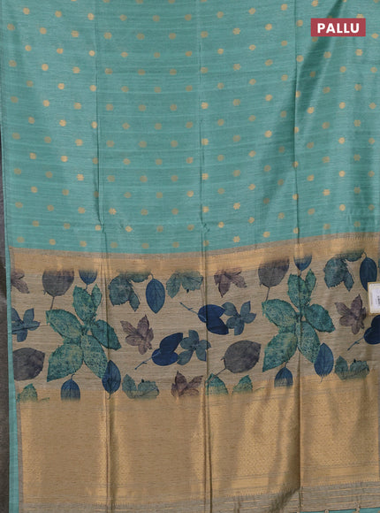 Art dupion saree teal green and beige with allover zari woven buttas and printed pallu