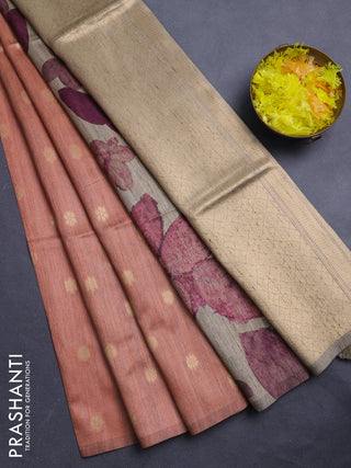 Art dupion saree orange shade and beige with allover zari woven buttas and printed pallu