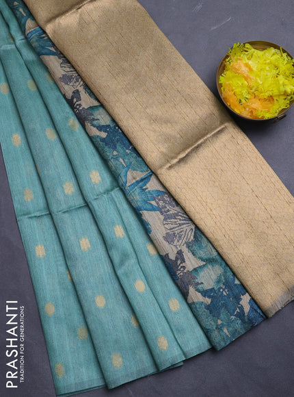 Art dupion saree teal green and beige with allover zari woven buttas and printed pallu