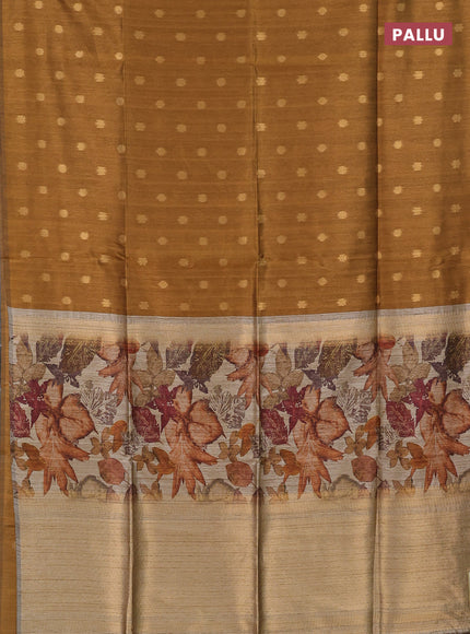 Art dupion saree dark mustard and beige with allover zari woven buttas and printed pallu