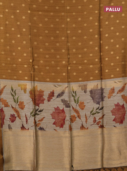 Art dupion saree dark mustard and beige with allover zari woven buttas and printed pallu