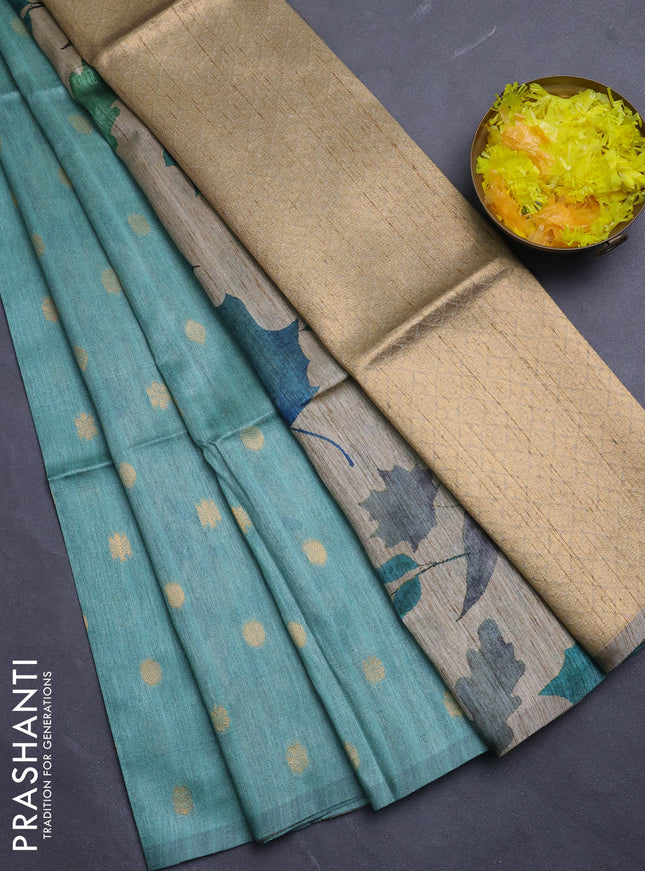 Art dupion saree teal green and beige with allover zari woven buttas and printed pallu