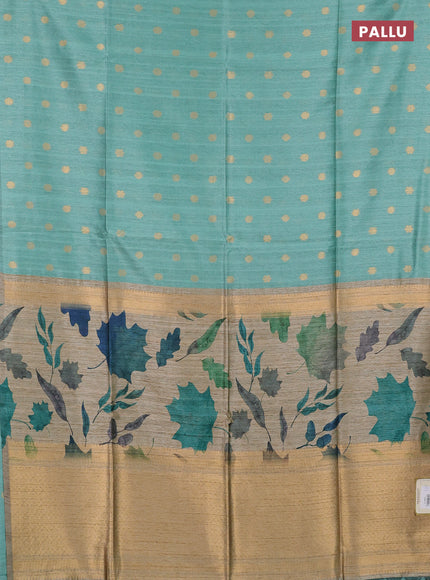 Art dupion saree teal green and beige with allover zari woven buttas and printed pallu