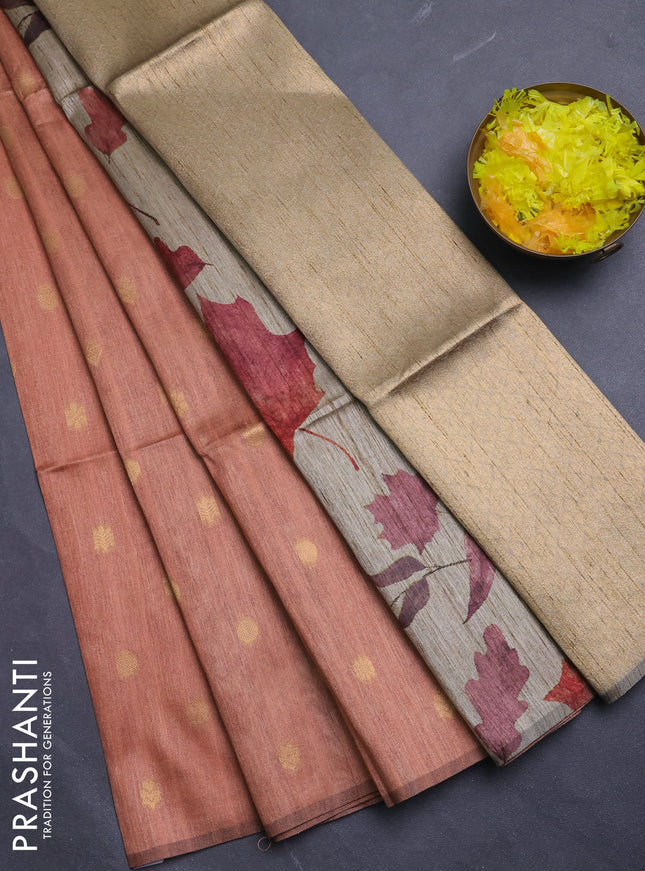 Art dupion saree orange shade and beige with allover zari woven buttas and printed pallu