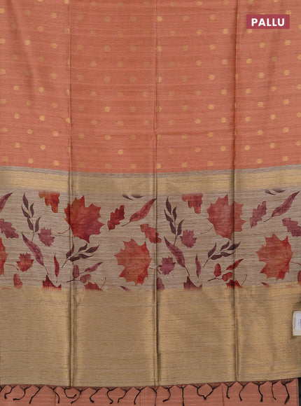 Art dupion saree orange shade and beige with allover zari woven buttas and printed pallu
