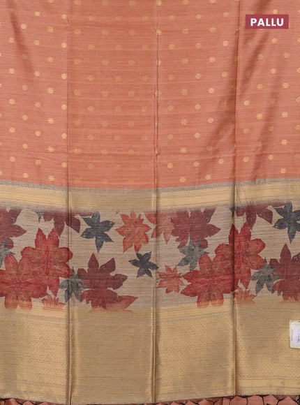 Art dupion saree orange shade and beige with allover zari woven buttas and printed pallu