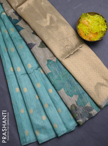 Art dupion saree teal green and beige with allover zari woven buttas and printed pallu