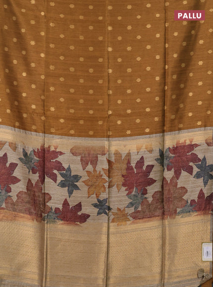 Art dupion saree dark mustard and beige with allover zari woven buttas and printed pallu