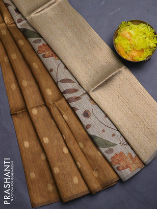 Art dupion saree dark mustard and beige with allover zari woven buttas and printed pallu