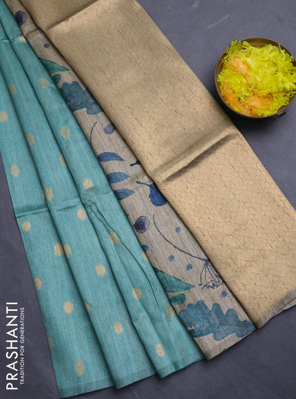 Art dupion saree teal green and beige with allover zari woven buttas and printed pallu