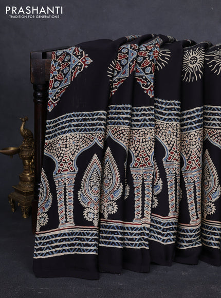 Modal Silk Saree black with allover ajrakh prints and long printed border