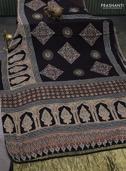 Modal Silk Saree black with allover ajrakh prints and long printed border