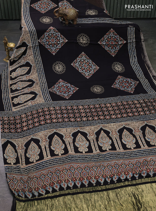 Modal Silk Saree black with allover ajrakh prints and long printed border