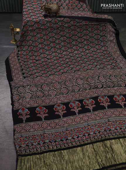 Modal Silk Saree black with allover ajrakh prints and printed border