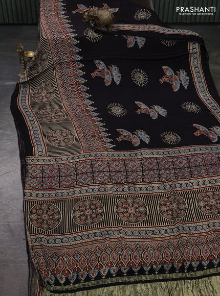 Modal Silk Saree black with allover ajrakh prints and printed border