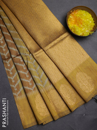 Bhagalpuri tussar saree dark mustard with allover zigzag ikat prints and zari woven butta prints