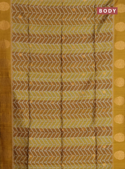 Bhagalpuri tussar saree dark mustard with allover zigzag ikat prints and zari woven butta prints