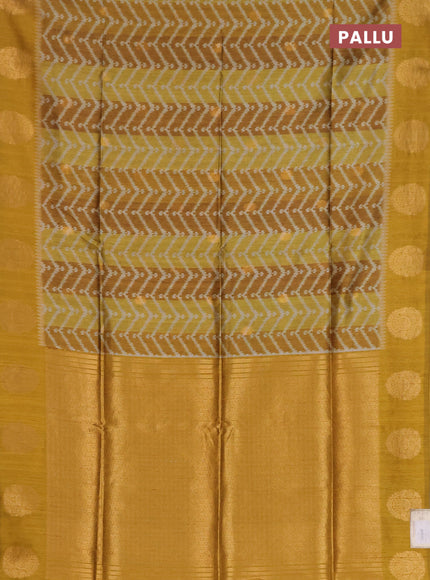 Bhagalpuri tussar saree dark mustard with allover zigzag ikat prints and zari woven butta prints