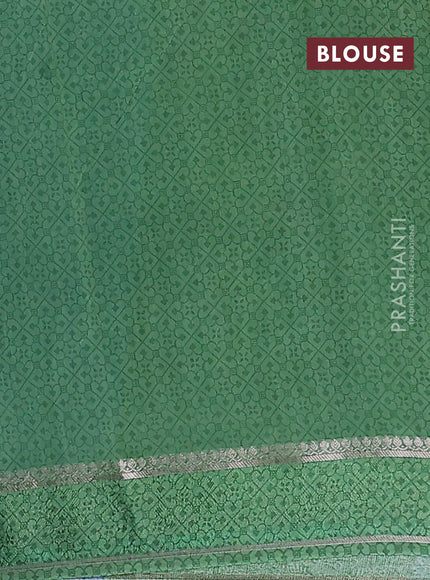 Chanderi silk cotton saree blue and green with allover floral prints and woven border