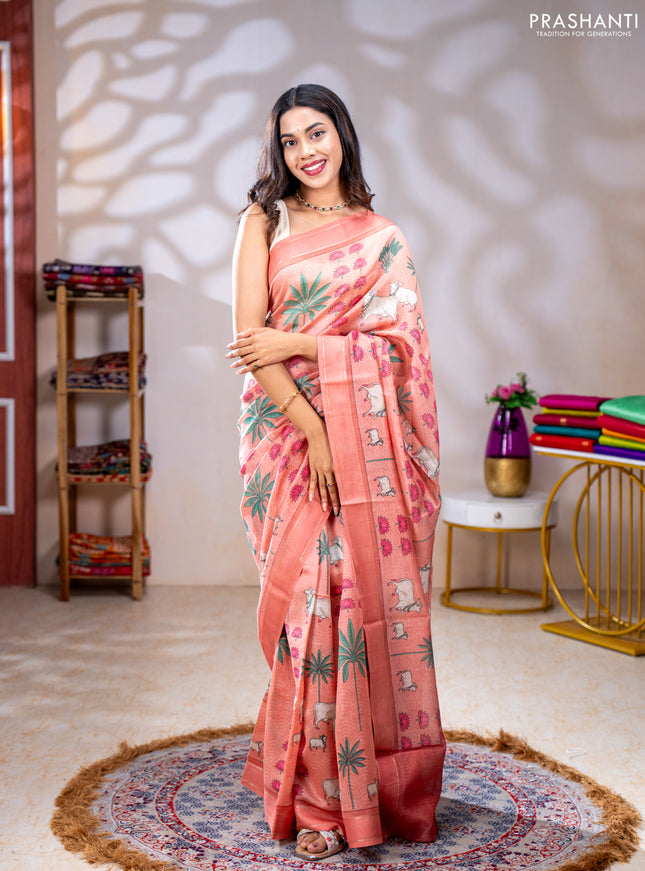 Chanderi silk cotton saree peach shade with allover pichwai prints and woven border
