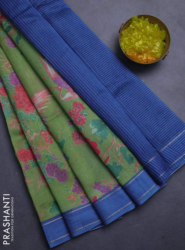 Chanderi silk cotton saree light green and blue with allover floral prints and woven border