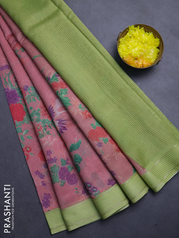 Chanderi silk cotton saree mild peach and light green with allover floral prints and woven border