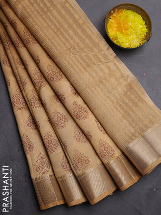 Semi raw silk saree sandal with allover butta prints and zari woven border