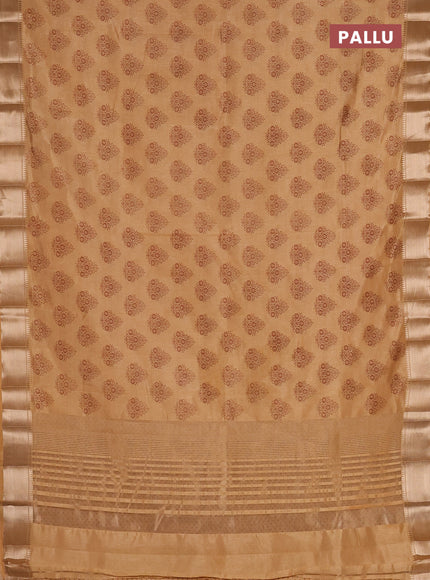 Semi raw silk saree sandal with allover butta prints and zari woven border