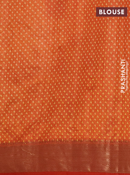 Semi raw silk saree rust shade with allover butta prints and zari woven border