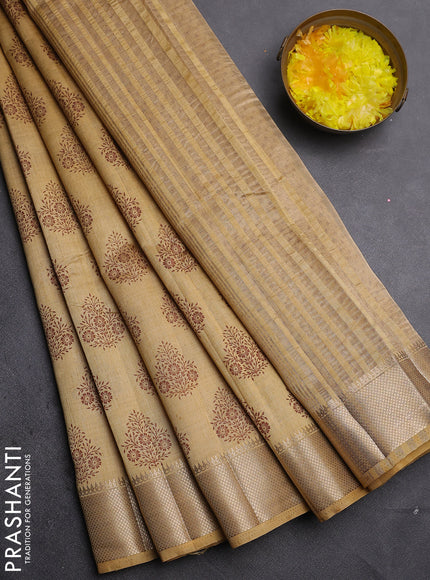 Semi raw silk saree mustard shade with allover butta prints and zari woven border