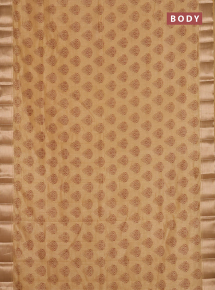 Semi raw silk saree mustard shade with allover butta prints and zari woven border