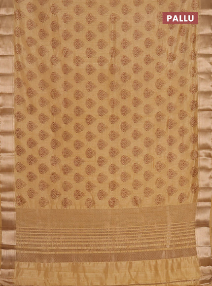 Semi raw silk saree mustard shade with allover butta prints and zari woven border