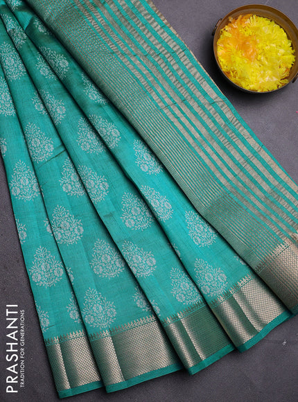 Semi raw silk saree teal blue with allover butta prints and zari woven border